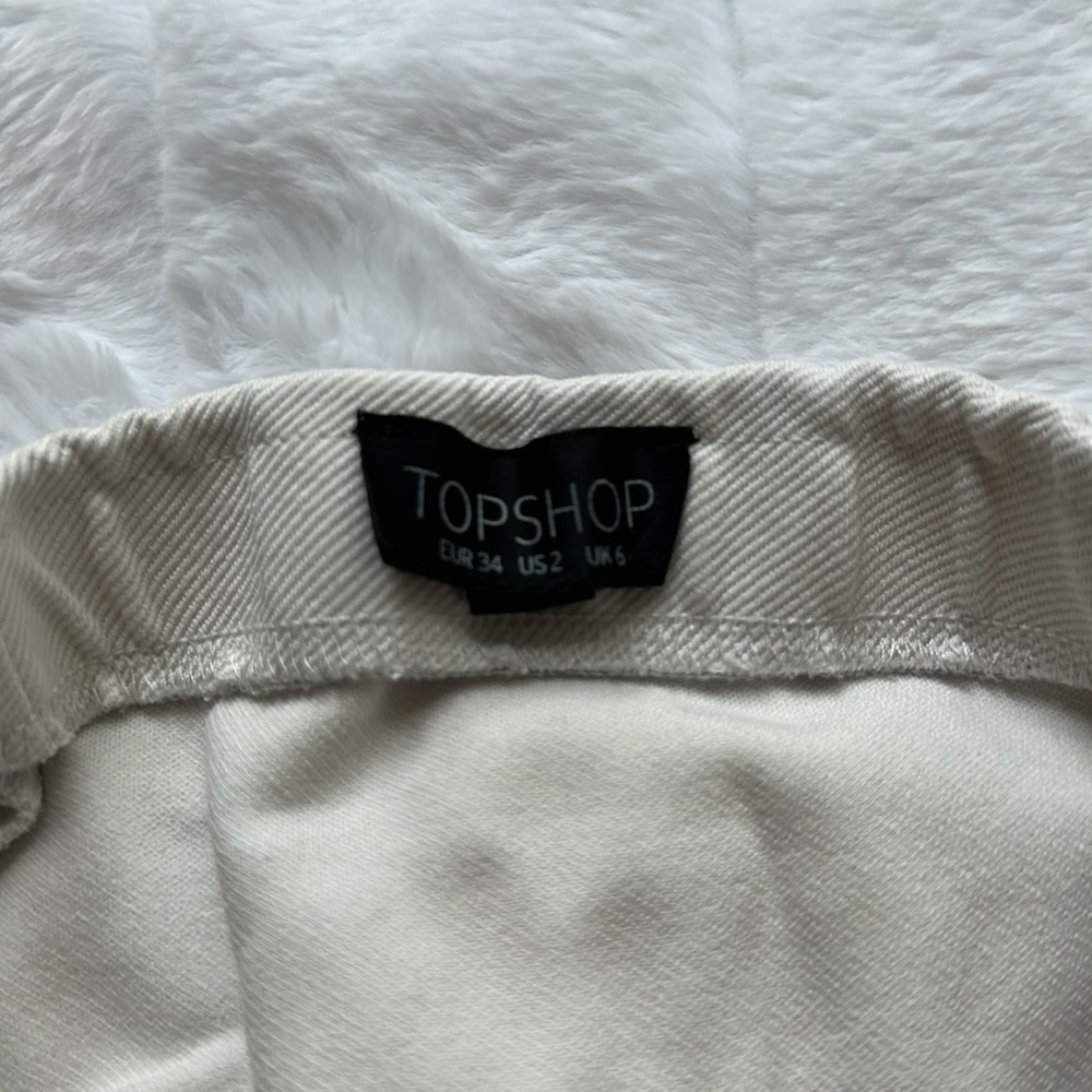 White TopShop mini white skirt
Size 2 - Picture 6 of 6